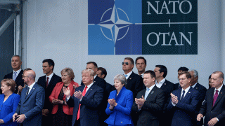In this July 11, 2018, file photo, NATO leaders, including President Donald Trump, applaud after posing for a family photo during the NATO (North Atlantic Treaty Organization) summit at the NATO headquarters in Brussels.