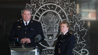 Royal Canadian Mounted Police (RCMP) Chief Supt. Chris Leather (left) and RCMP commanding officer Lee Bergman deliver a news conference in the wake of a deadly shooting rampage near the town of Portapique that left at least 16 people dead, April 19, 2020, at RCMP headquarters in Dartmouth, Nova Scotia, Canada.