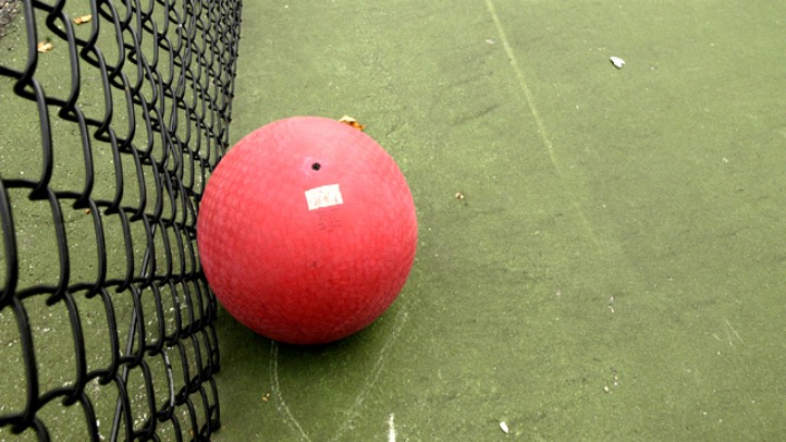 large red rubber ball for children to bounce on