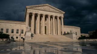 This file photo taken June 20, 2019, shows the Supreme Court under stormy skies in Washington.