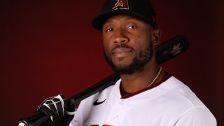 In this Feb. 21, 2020, file photo, Starling Marte #2 of the Arizona Diamondbacks poses for a portrait during MLB media day at Salt River Fields at Talking Stick in Scottsdale, Arizona.