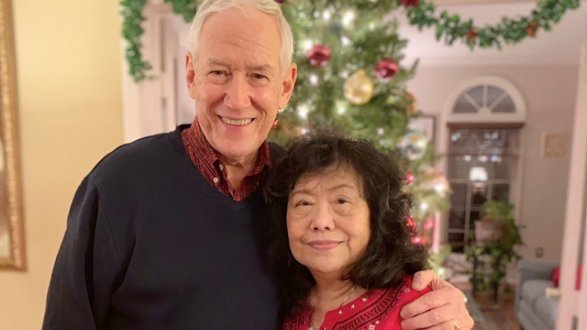In this December, 2018 photo released by the Stemberger family, Victor and his wife Han Stemberger, are shown at their home in Centreville, Va. Victor Stemberger sits in a Spanish jail, one year after flying into the country with 2.4 kilograms (more than 5 pounds) of cocaine expertly sewn into bubble jackets in a bag. His family says he knew nothing about the drugs.