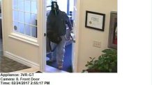 Suspect in Bank Robbery at Main Door