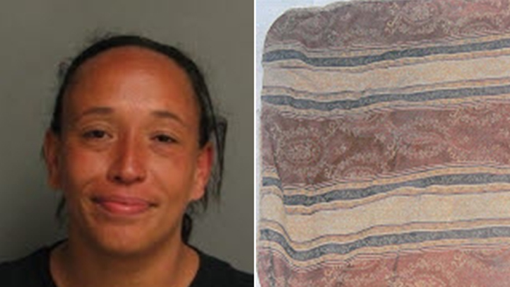 On June 15, 2009, Tammy Jo Charland, 38, was found dead in an alley in the 3000 block of Main Street. Her body was wrapped in the blanket seen in this photograph. Homicide detectives say an examination of the crime scene revealed Charland was murdered, but a suspect was never caught. Charland was homeless and known to frequent the area where her body was discovered.
