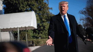 President Donald Trump answers questions from the media before departing the White House on Dec. 7, 2019, in Washington.