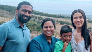 Dr. Sruthi Thomas and her family with Alex Fraser.