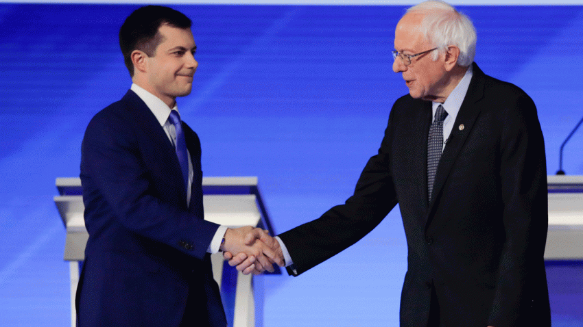 Democratic presidential candidates former South Bend Mayor Pete Buttigieg and Sen. Bernie Sanders, I-Vt., shake hands on stage Friday, Feb. 7, 2020, before the start of a Democratic presidential primary debate hosted by ABC News, Apple News, and WMUR-TV at Saint Anselm College in Manchester, N.H.