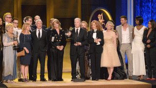 FILE - This April 29, 2018 file photo shows Ken Corday, center, and the cast and crew of "Days of Our Lives" accepting the award for outstanding drama series at the 45th annual Daytime Emmy Awards in Pasadena, Calif.