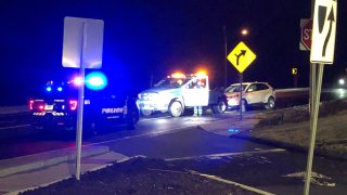 police at the scene of a car crash in Farmington