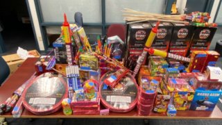 police display fireworks seized during an arrest in Hartford