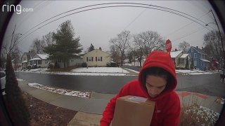 man in red hoodie captured on doorbell camera