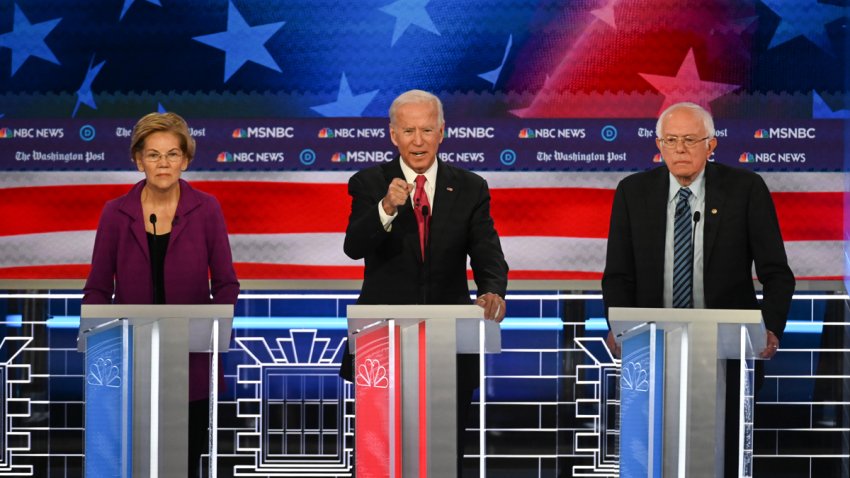 Presidential candidates Sen. Elizabeth Warren (D-Mass.), former vice president Joe Biden and Sen. Bernie Sanders (I-Vt.) during the Democratic presidential debate at Tyler Perry Studios on Wednesday, November 20, 2019, in Atlanta, Georgia.