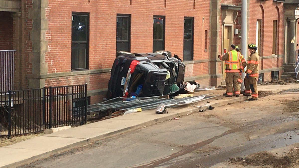 Car Rolls Down Hill, Narrowly Misses Building During Wethersfield Crash