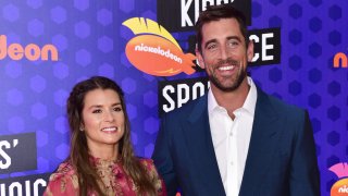 Danica Patrick and Aaron Rodgers attend Nickelodeon Kids’ Choice Sports Awards 2018 at Barker Hangar on July 19, 2018, in Santa Monica, California.