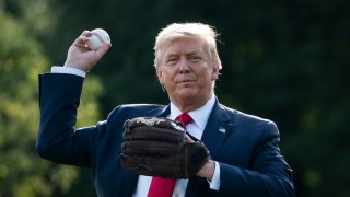 President Trump throwing a baseball