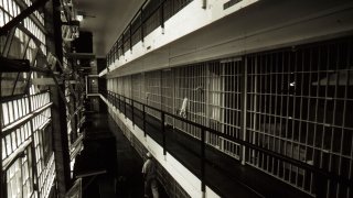 Prison cells line a hall at the Ellis death row unit in Huntsville Prison in Huntsville, Texas.