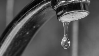 Water dripping from faucet