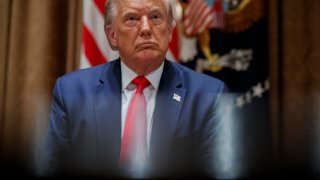 President Donald Trump listens during a meeting with U.S. tech workers, before signing an Executive Order on hiring American workers, in the Cabinet Room of the White House, Monday, Aug. 3, 2020, in Washington.