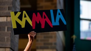 A rally attendee holds a campaign sign during a rally held by 2020 Democratic Presidential hopeful Senator Kamala Harris (D-CA) in Davenport, Iowa on August 12, 2019s.
