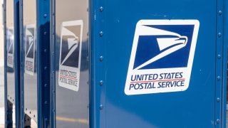 A United States Postal Service (USPS) mailbox.