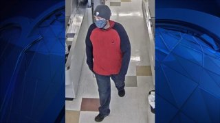 surveillance photo of a bank robbery suspect