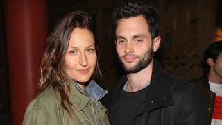 In this April 30, 2017, file photo, Domino Kirke and Penn Badgley attend The Weinstein Company and Lyft host a special screening of "3 Generations" in New York City.