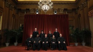 This Nov. 30, 2018, photo, shows United States Supreme Court (Front L-R) Associate Justice Stephen Breyer, Associate Justice Clarence Thomas, Chief Justice John Roberts, Associate Justice Ruth Bader Ginsburg, Associate Justice Samuel Alito, Jr., (Back L-R) Associate Justice Neil Gorsuch, Associate Justice Sonia Sotomayor, Associate Justice Elena Kagan and Associate Justice Brett Kavanaugh as they pose for their official portrait in the East Conference Room at the Supreme Court building