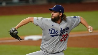 Los Angeles Dodgers starting pitcher Clayton Kershaw throws against the Tampa Bay Rays during the first inning in Game 5 of the baseball World Series Sunday, Oct. 25, 2020, in Arlington, Texas.