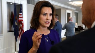 Michigan Governor Gretchen Whitmer speaks to a reporter