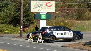 Police car outside a supermarket in Wolcott