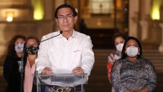 Peru's President Martin Vizcarra speaks in front of the presidential palace after lawmakers voted to remove him from office in Lima, Peru, Monday, Nov. 9, 2020. Lawmakers voted to impeach Vizcarra, accusing him of taking bribes years ago and poorly handling the country's response to the coronavirus pandemic.