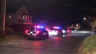 police cars parked outside home in Plymouth, CT