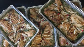 trays full of sliced turkey