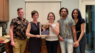 “We had a picture of my husband and my daughter put a candle in front of his picture at the head of the table,” Wanda Dench said. This is the fifth year in a row Wanda Dench and Jamal Hinton have celebrated the Thanksgiving holiday together after a random texting error.