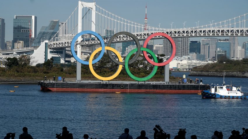 In this Dec. 1, 2020, file photo, the Olympic Symbol is reinstalled after it was taken down for maintenance ahead of the postponed Tokyo Olympics in the Odaiba section in Tokyo.