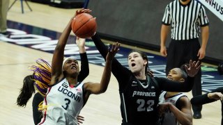 Connecticut forward Aaliyah Edwards (3) works for the rebound against Providence guard Olivia Orlando (22) in the second half of an NCAA college basketball game at Harry A. Gampel Pavilion, Saturday, Jan. 9, 2021, in Storrs, Conn. (David Butler II/Pool Photo via AP)
