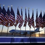 Air Force One is prepared for Donald Trump for his last ride as the President of the United States, as flags fly on a stage at Andrews Air Force Base, Maryland, Jan. 20, 2021.