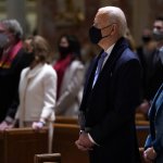 President-elect Joe Biden and incoming first lady Jill Biden celebrate Mass at the Cathedral of St. Matthew the Apostle during Inauguration Day, Jan. 20, 2021, in Washington.