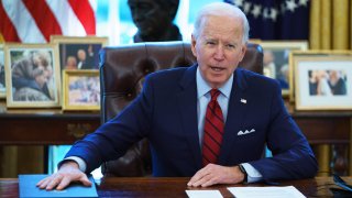 President Joe Biden speaks before signing executive orders on health care in the Oval Office.