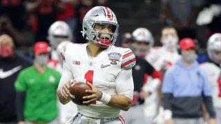 Ohio State Buckeyes quarterback Justin Fields (1) attempts a pass against the Clemson Tigers during the first half at Mercedes-Benz Superdome.