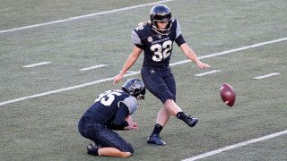 In this Dec. 12, 2020, file photo, Vanderbilt Commodores place kicker Sarah Fuller (32) kicks an extra point to become the first female to score a point for a power five conference team during a game between the Vanderbilt Commodores and Tennessee Volunteers at Vanderbilt Stadium in Nashville, Tennessee.