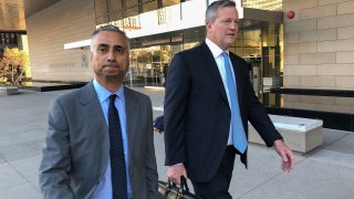 In this Nov. 22, 2019 file photo, Imaad Zuberi, left, leaves the federal courthouse with his attorney Thomas O'Brien, right, in Los Angeles. Federal prosecutors on Tuesday, Jan. 7, 2020, charged Zuberi, a major donor to President Donald Trump's Inaugural Committee, with obstructing a federal investigation into whether foreign nationals unlawfully contributed to the inaugural celebrations.