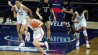 Connecticut guard Nika Muhl (10) in the first half of an NCAA college basketball game against South Carolina in Storrs, Conn., Monday, Feb. 8, 2021.