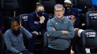Connecticut coach Geno Auriemma watches from the sideline during the first half of the team's NCAA college basketball game against Seton Hall, Feb. 10, 2021, in Storrs, Connecticut.