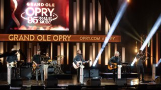 In this image released on February 14th, Dierks Bentley and Marty Stuart perform during the "Grand Ole Opry: 95 Years of Country Music" special at the Grand Ole Opry in Nashville, Tennessee.