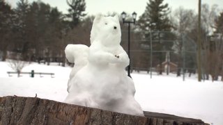 snow sculpture in the shape of a squirrel