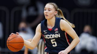 In this Feb. 27, 2021, file photo, Connecticut guard Paige Bueckers (5) plays against Butler during the first quarter of an NCAA college basketball game in Indianapolis, Indiana.