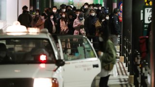 people wait for taxis around Sendai Station