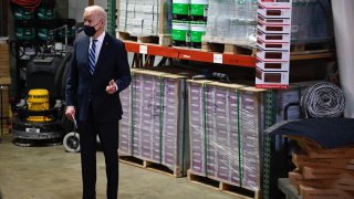 US President Joe Biden speaks while visiting Smith Flooring, a small minority-owned business, to promote his American Rescue Plan in Chester, Pennsylvania, on March 16, 2021.