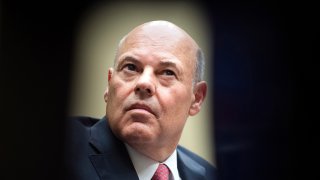 FILE - Postmaster General Louis DeJoy testifies during a House Oversight and Reform Committee hearing on the Postal Service on Capitol Hill, Aug. 24, 2020, in Washington.